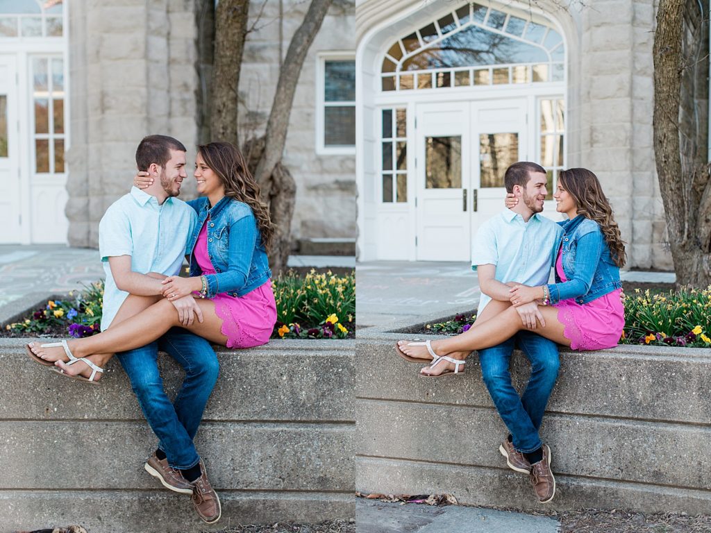 Young couple posing for engagement photos at ISU with Jennifer Council 